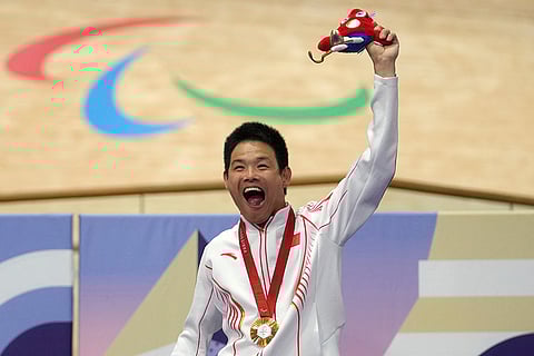 Paris Paralympics 2024 Day 1, Men's C1 3000m individual pursuit final: China's Zhangyu Li, celebrates with gold